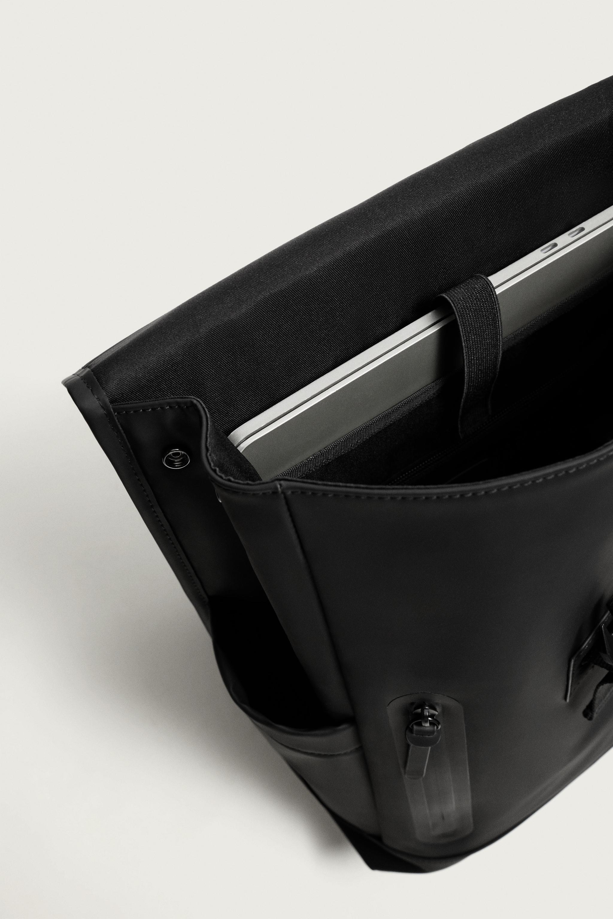 RUBBERIZED FLAP BACKPACK